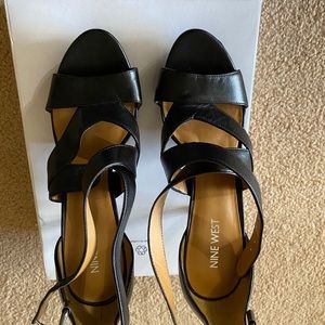 New Size 8 NineWest open toed ankle straps with adjustable buckle.